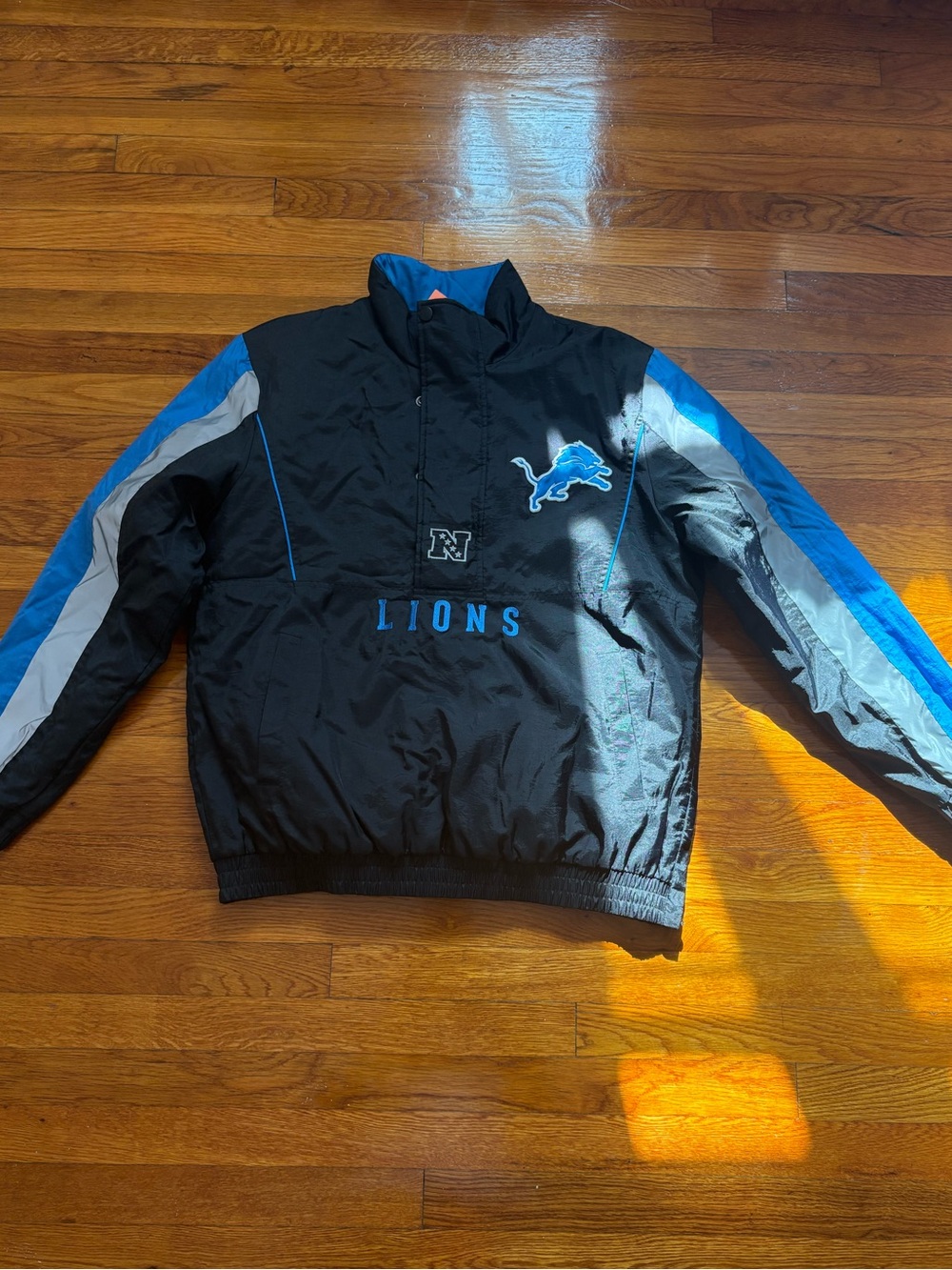 STARTER Detroit Lions Black & Blue Pullover Windbreaker